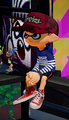 Another male Inkling wearing the Camo Mesh.