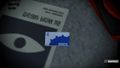 A CQ card found in Inkopolis Square on top of a poster featuring the Kamabo Co. logo.