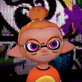 Closeup of a male Inkling wearing the Full Moon Glasses.