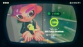 Agent 8 being awarded the Key mem cake upon completing the station