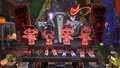Promotional screenshot showcasing players atop Big Man's float