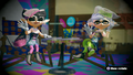 Still of the Squid Sisters waving at the player from their studio