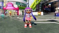 An Inkling girl in Inkopolis Plaza