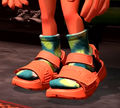 An Inkling trying on the Orange Dadfoot Sandals in Crush Station.
