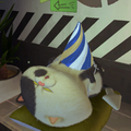 Judd wearing a party hat