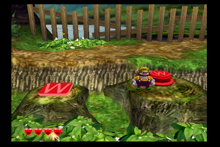 File:Wario World Greenhorn Forest Red Button and Treasure.png