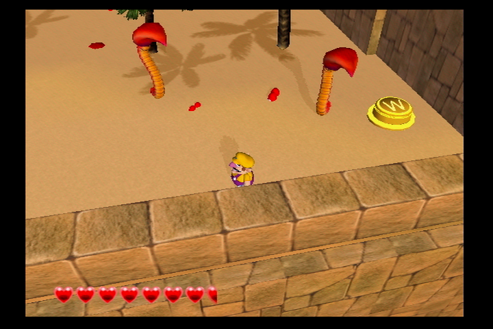 File:Wario World Pecan Sands Yellow Button.png