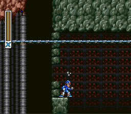 ...then destroy the blocks and stand in the position shown. Note: if you break the two blocks to the left of Mega Man, you will have more room to perform a dash jump.