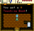 Zelda Ages Trading Touching Book.png