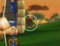 ;Target 1:You can see the orange at the back of the tennis courts during the intro the level, but it's hard to see while aiming. The courts are just to the right of the palm on the right side of the target.