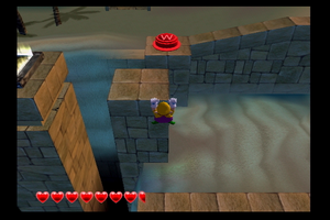 Wario World Pecan Sands Red Button.png