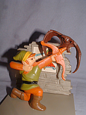 File:TLoZ Link Shooting an Arrow to a Red Keese Figure.png
