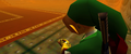 The Triforce of Courage appearing on Link's hand in Ocarina of Time