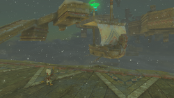 A screenshot of Tulin looking toward a Flying Ship during a Blizzard