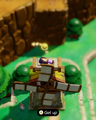 A promotional screenshot of Zelda using an Old Bed on a windmill