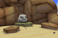 A Stone Head sits on the entrance to Earth Temple at Headstone Island in The Wind Waker