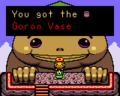 Link receiving the Goron Vase in Oracle of Seasons.