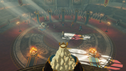 A screenshot of King Rhoam standing above the Champions within Hyrule Castle's Throne Room.