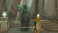 A promotional screenshot of Link speaking to the Great Goddess Statue from Tears of the Kingdom