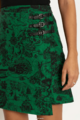 A model wearing a Hyrule Map Green Buckle Wrap A-Line Skirt