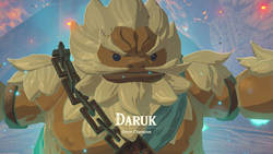 A screenshot of Daruk as a Spirit on top of Divine Beast Vah Rudania. Text on-screen displays his name, along with the title "Goron Champion".