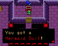 Link obtaining the Mermaid Suit in Mermaid's Cave, as seen in-game