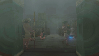 A screenshot of ancient Hylians moving about in the Forgotten Temple.