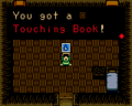Link obtaining the Touching Book, as seen in-game