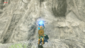 Link holding a cube-shaped Remote Bomb from Breath of the Wild