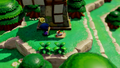 A promotional screenshot of Zelda with a Cat in Kakariko Village from Echoes of Wisdom