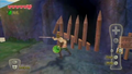 Link cutting down the stakes blocking the entrance to the Waterfall Cave with the Practice Sword