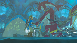 A screenshot of Sidon and Link in the Zora's Domain Throne Room. Sidon is kneeling down to shake Link's hand.