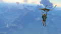 A promotional screenshot of Link using the Paraglider from Tears of the Kingdom