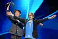 Eiji Aonuma and Hidemaro Fujibayashi accepting the "Game of the Year" award for Breath of the Wild at The Game Awards 2017