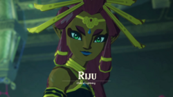 A screenshot of Riju inside Divine Beast Vah Naboris. Text on-screen displays her name, along with the title "Child of Lightning".
