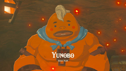 A screenshot of Yunobo inside the Vault. Text on-screen displays his name, along with the title "Goron Youth".