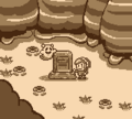 Photograph of Link and the Ghost in its grave from Link's Awakening DX