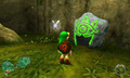 Link talking to a Sheikah Stone from Ocarina of Time 3D