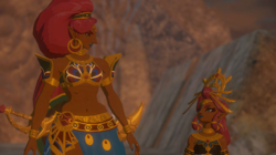 A screenshot of Riju and Urbosa looking at each other while standing atop Divine Beast Vah Naboris.