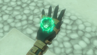 A screenshot of the power of Ultrahand appearing in Link's hand.