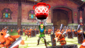`Link en train de soulever un pot avec les gantelets d'Argent dans Hyrule Warriors.