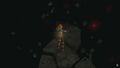 Zelda tombe, éclairée par une lumière dorée.